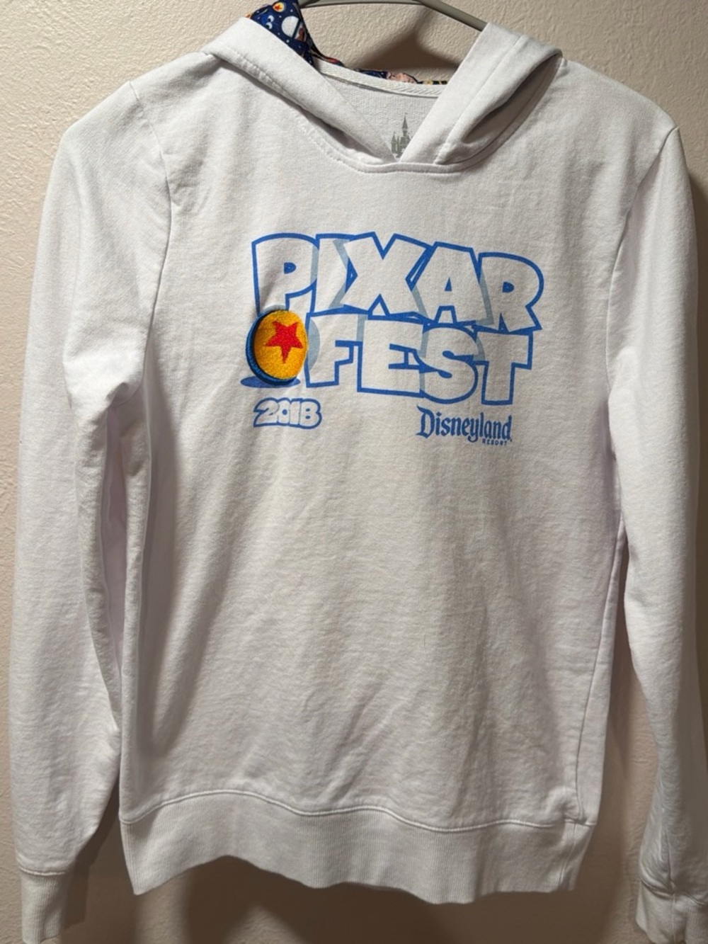 Disney Pixar Fest White Hoodie with Blue Logo and Yellow Star Ball